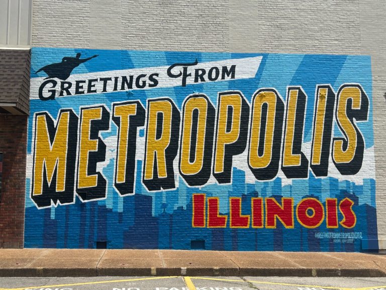 "Greetings from Metropolis Illinois – Iconic Wall Mural Downtown" "Colorful 'Greetings from Metropolis Illinois' wall mural painted on downtown building, showcasing local charm and city pride"